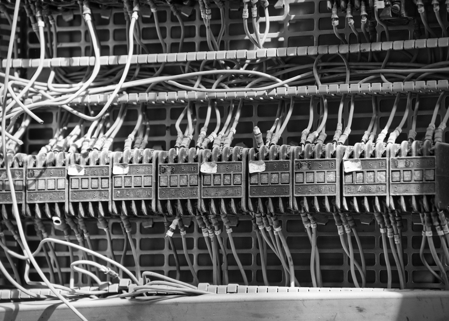Intricate electrical wiring and terminal blocks in an industrial setting.